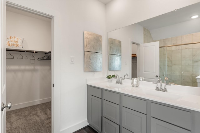 bathroom featuring vanity and walk in shower