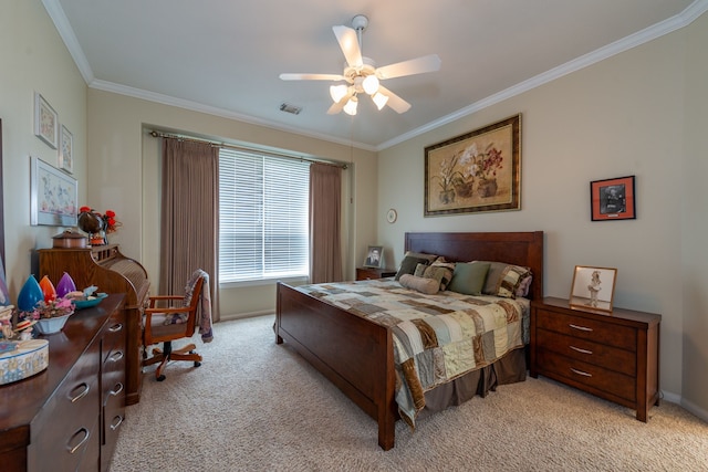 carpeted bedroom featuring crown molding and ceiling fan