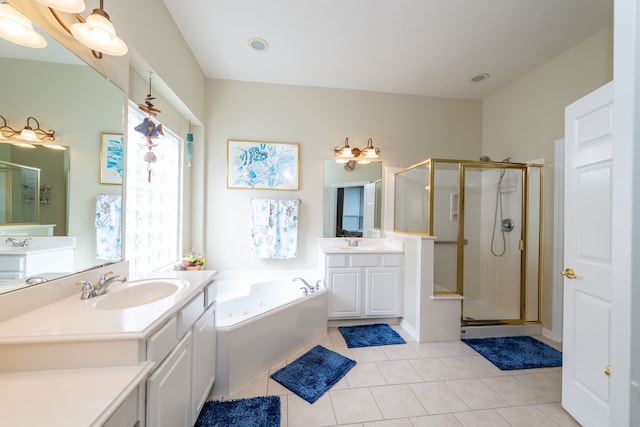 bathroom with tile patterned floors, vanity, and plus walk in shower