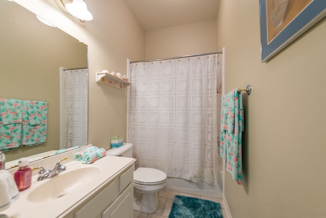 full bathroom with tile patterned flooring, vanity, shower / tub combo with curtain, and toilet