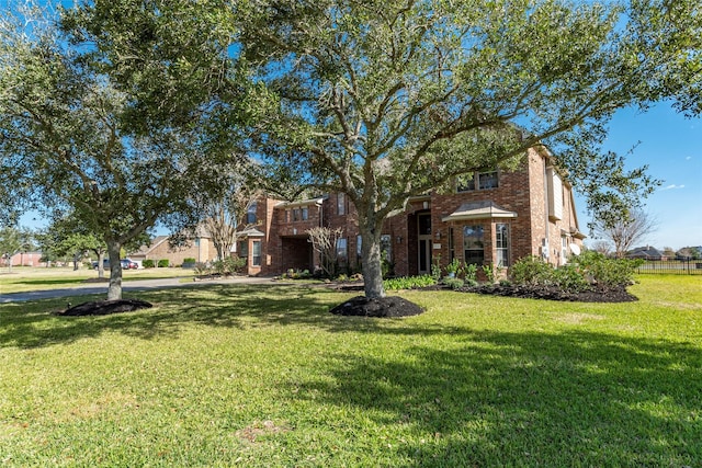 view of front of property with a front yard