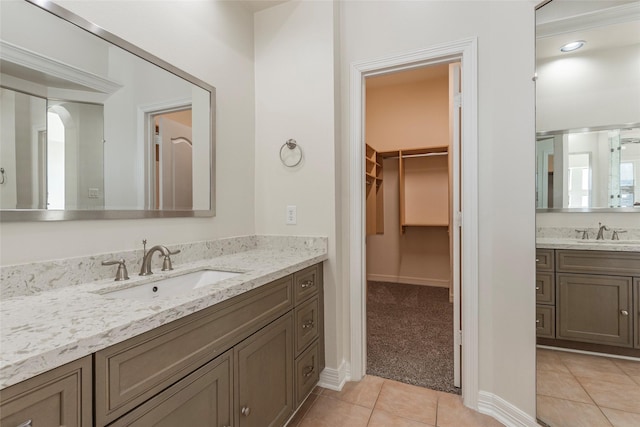 bathroom featuring tile patterned floors and vanity