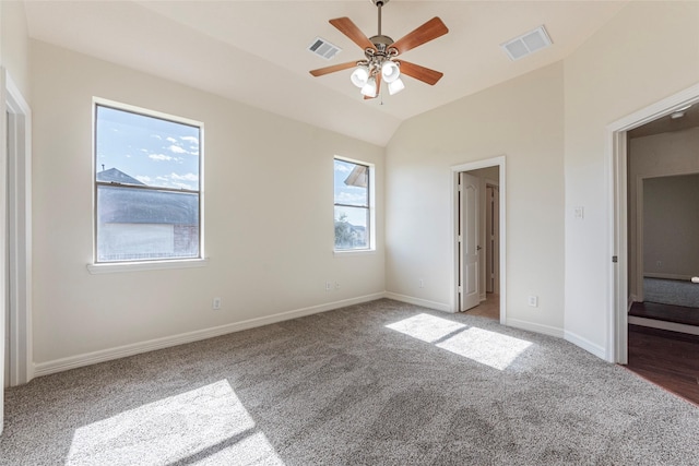 unfurnished bedroom with vaulted ceiling, carpet floors, and ceiling fan