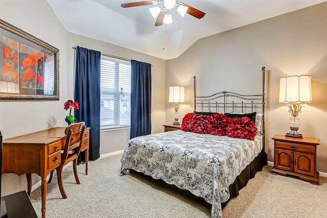 carpeted bedroom featuring vaulted ceiling and ceiling fan