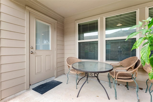 property entrance featuring a patio area