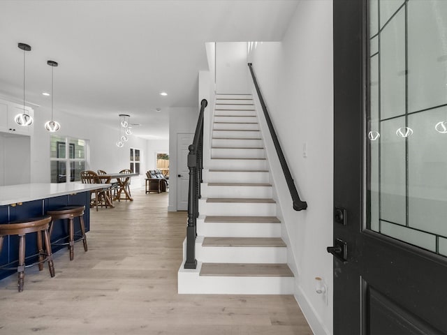 entryway with light hardwood / wood-style floors