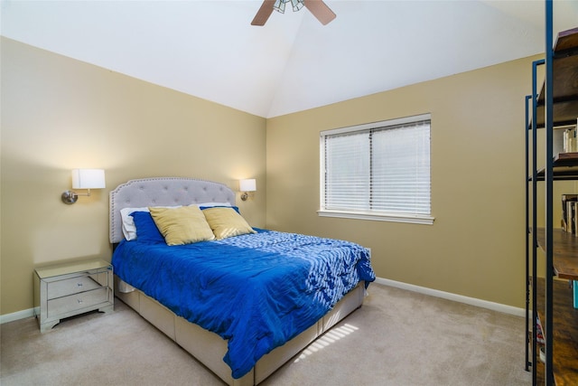 carpeted bedroom featuring lofted ceiling and ceiling fan