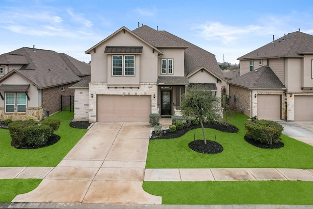 view of front of property featuring a garage and a front yard