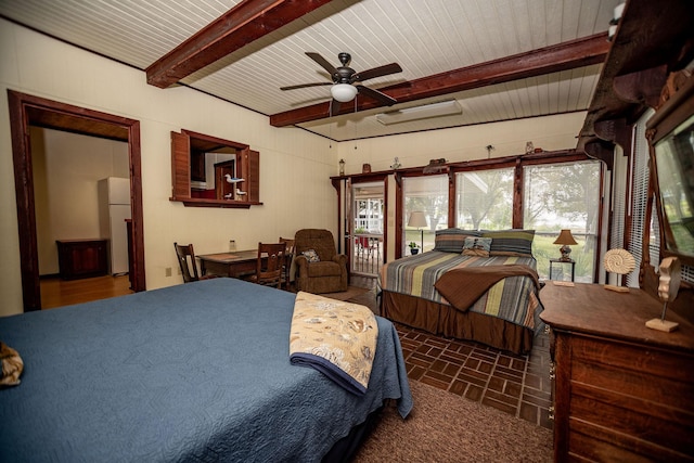 bedroom with beamed ceiling, ceiling fan, access to exterior, and white fridge