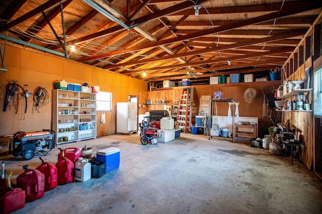 garage featuring white refrigerator