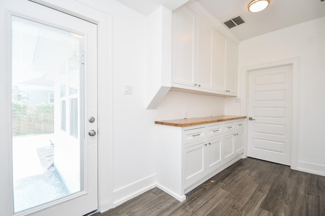 interior space with dark hardwood / wood-style floors