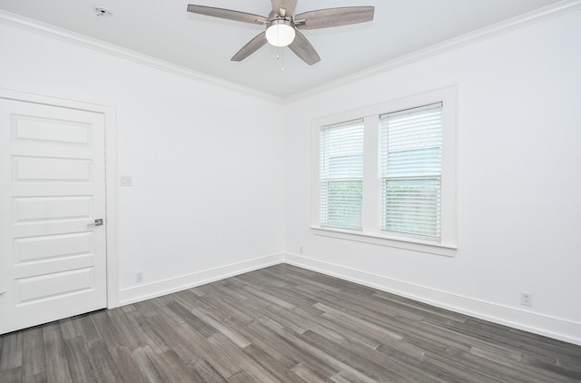 empty room featuring ornamental molding, ceiling fan, and dark hardwood / wood-style flooring