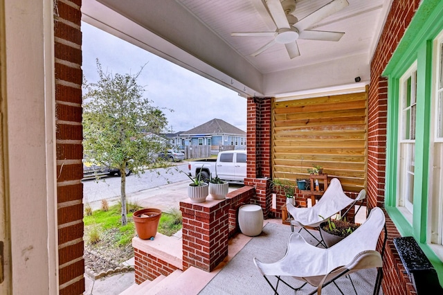 view of patio / terrace featuring covered porch and ceiling fan