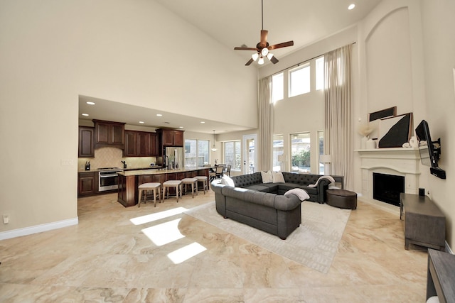 living room featuring ceiling fan