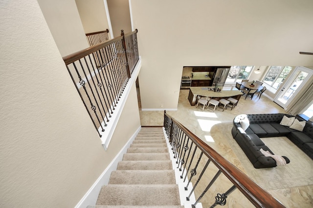 stairway with a high ceiling