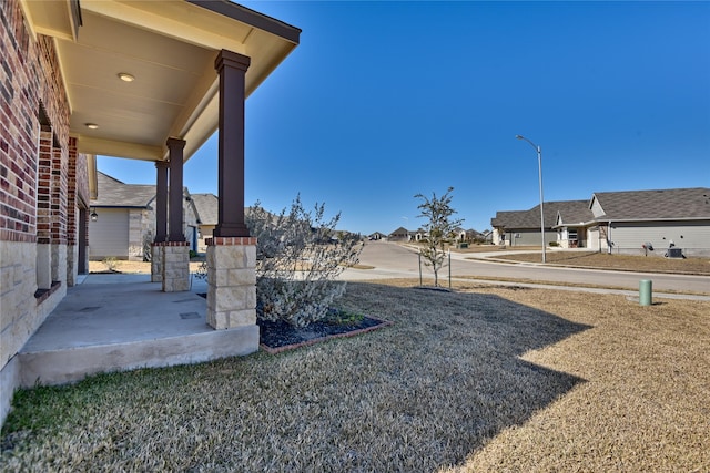 view of yard with a porch