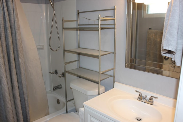 full bathroom with vanity, toilet, and shower / tub combo