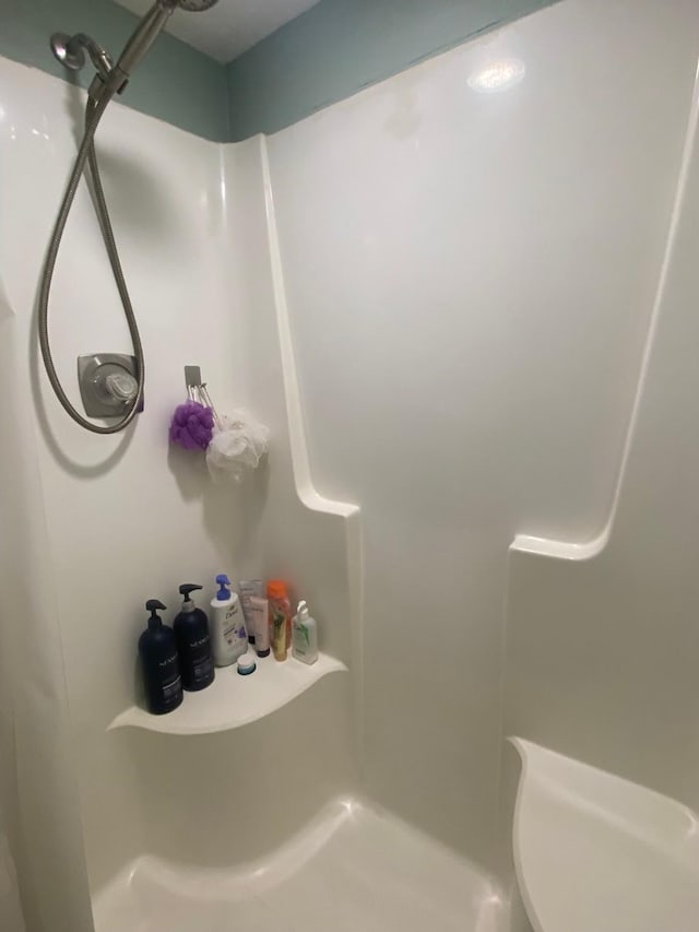 bathroom featuring a shower