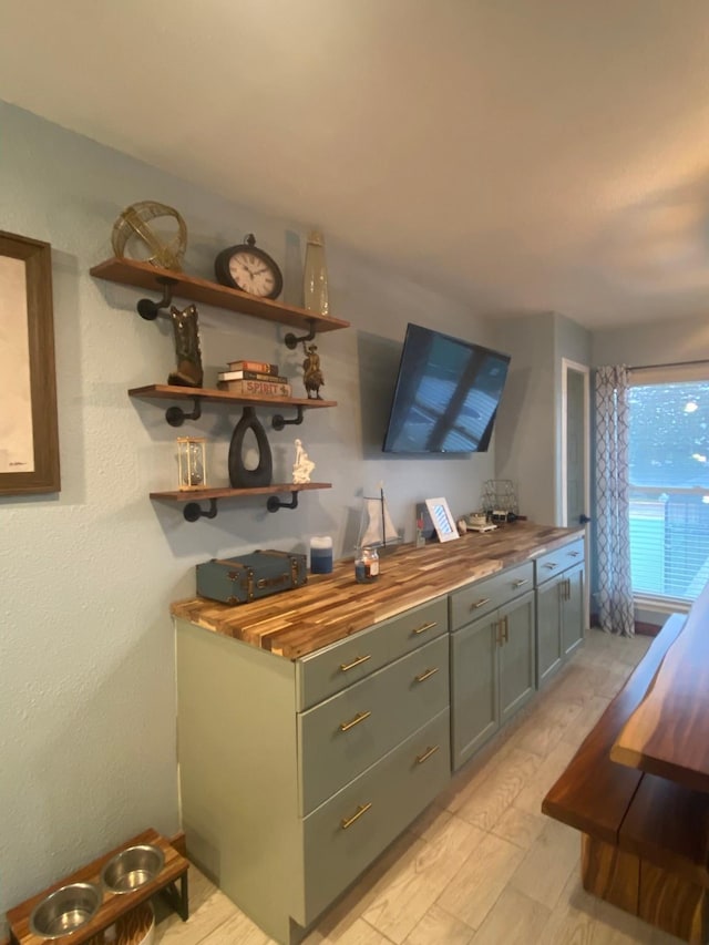 bar featuring butcher block countertops