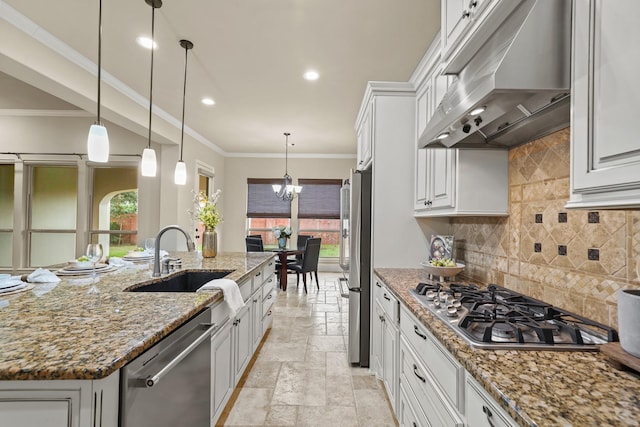 kitchen featuring white cabinetry, exhaust hood, dark stone counters, and appliances with stainless steel finishes