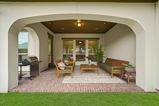 view of patio / terrace featuring area for grilling and outdoor lounge area