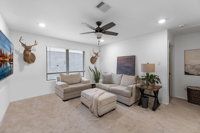 living room with light carpet and ceiling fan