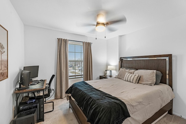 bedroom with ceiling fan and light colored carpet