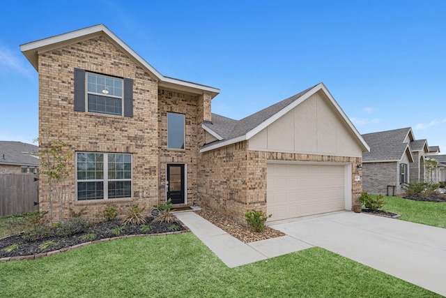 view of front of home with a garage and a front yard