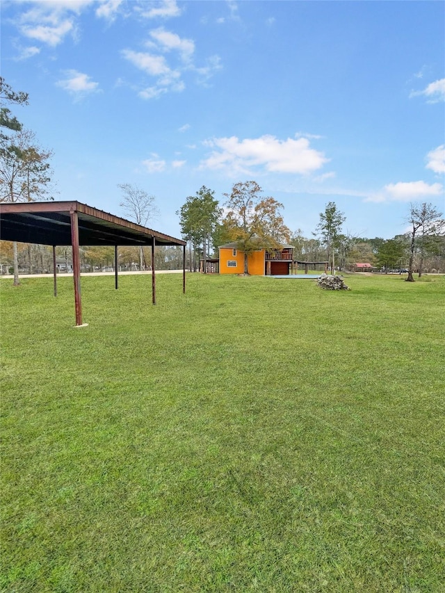 view of yard featuring a carport