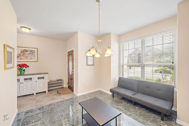 living room featuring a chandelier