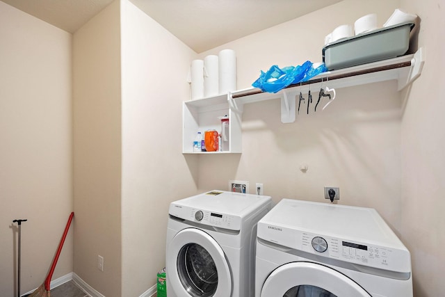 laundry area with separate washer and dryer