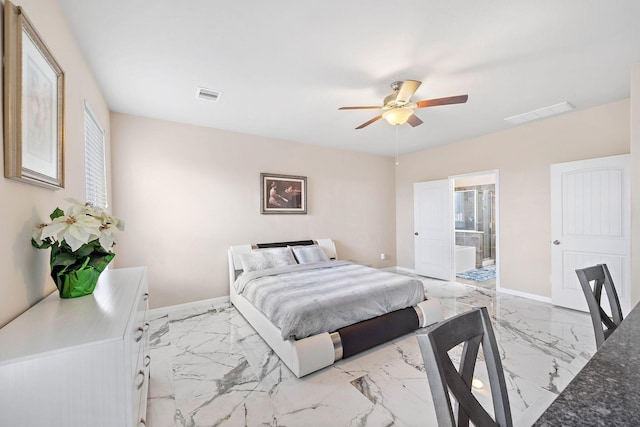 bedroom featuring ensuite bath and ceiling fan