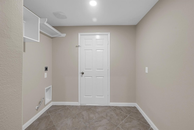 washroom featuring light tile patterned floors and hookup for an electric dryer