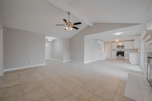 unfurnished living room with light tile patterned flooring, vaulted ceiling with beams, and ceiling fan