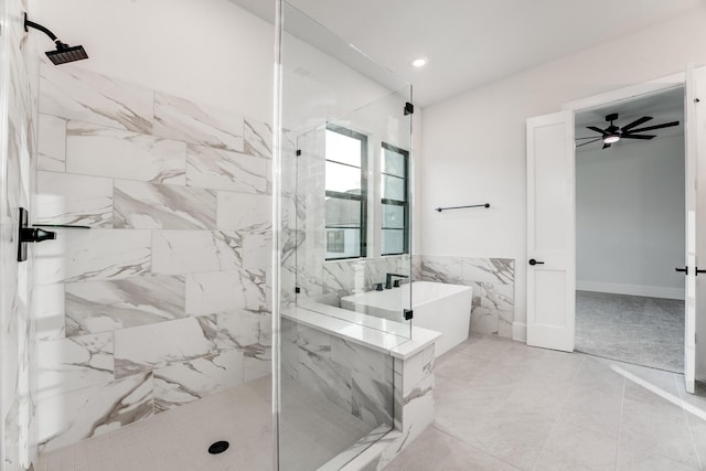 bathroom featuring ceiling fan, lofted ceiling, shower with separate bathtub, and tile walls