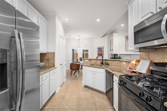 kitchen with sink, white cabinetry, light tile patterned floors, light stone countertops, and black appliances