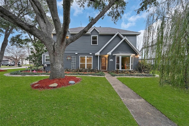 view of front of property with a front lawn