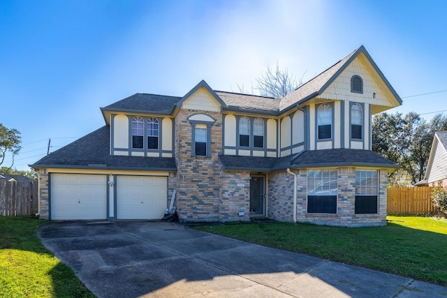 view of front facade featuring a garage and a front lawn