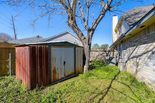 view of outdoor structure featuring a yard