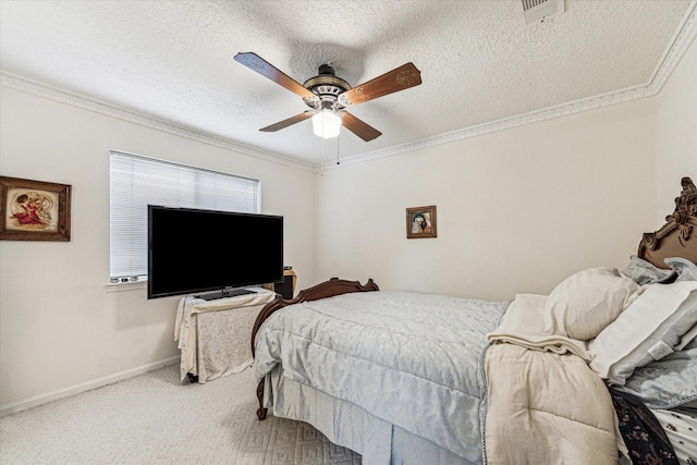 carpeted bedroom with ceiling fan, ornamental molding, and a textured ceiling