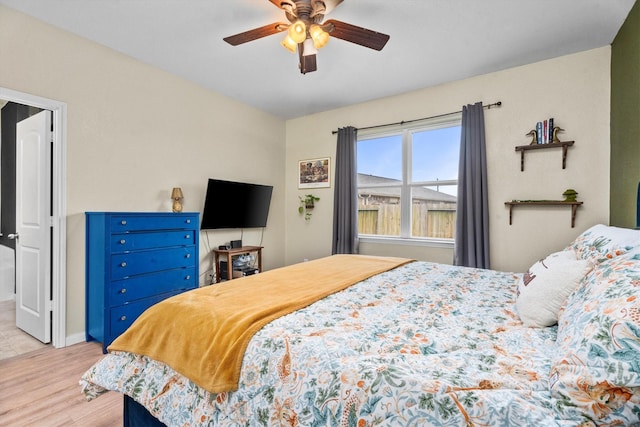 bedroom featuring ceiling fan and light hardwood / wood-style floors