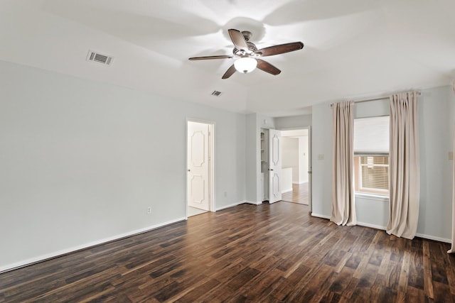 interior space with dark wood-type flooring and ceiling fan