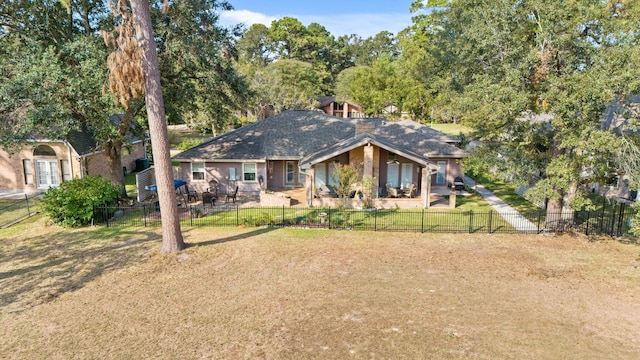 view of front of home with a front yard