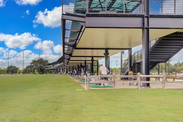 view of property's community featuring a lawn