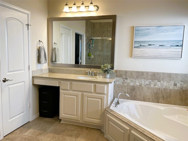 bathroom featuring tile patterned flooring, vanity, and plus walk in shower