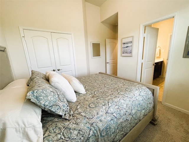 bedroom with a closet and carpet flooring