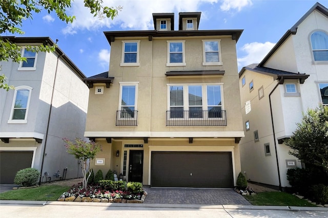 view of front of home with a garage