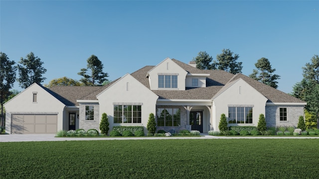 view of front of house with a garage and a front yard