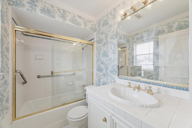 full bathroom with vanity, crown molding, enclosed tub / shower combo, and toilet