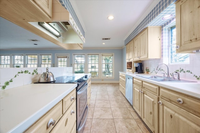 kitchen with sink, crown molding, appliances with stainless steel finishes, light tile patterned flooring, and light brown cabinetry